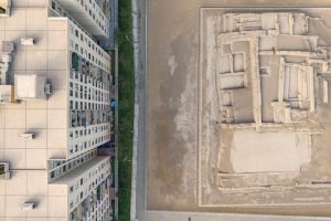 Aerial view of Huaca archeological site in San Miguel disctrict. Ancient pre-inca ruins in the middle of an urban city.