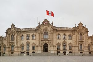 Lima, Peru - April 24, 2017: President palace in Peru Lima with big flag on top.